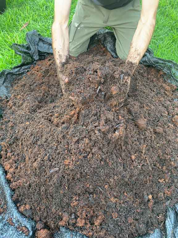 Blending the soil mix together