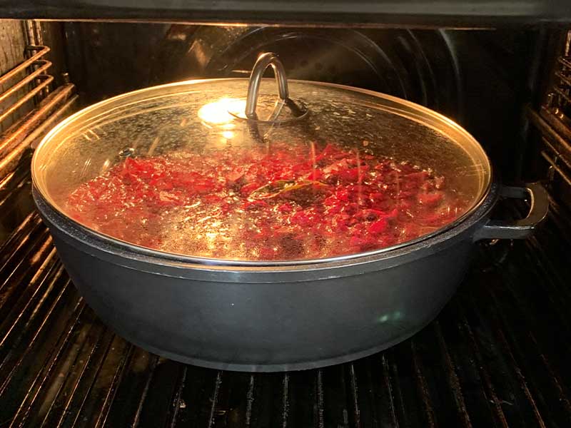 Homemade beetroot relish cooking in the oven