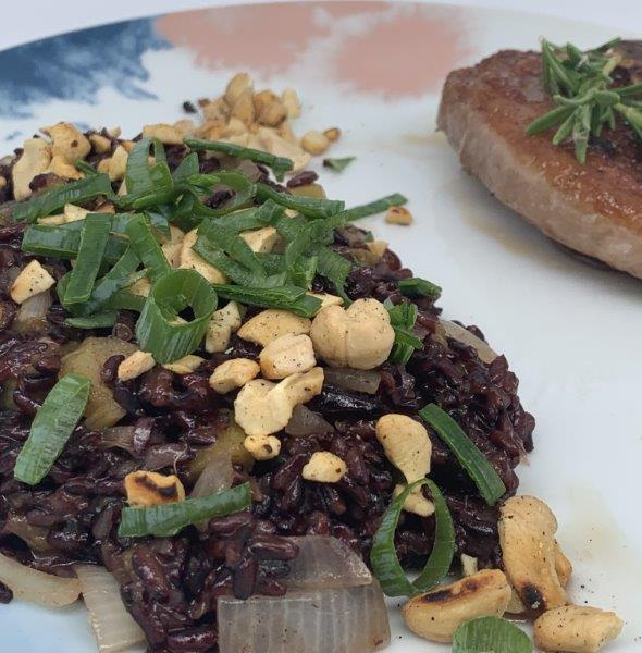 Rhubarb wild rice pilaf served with a lamb chop